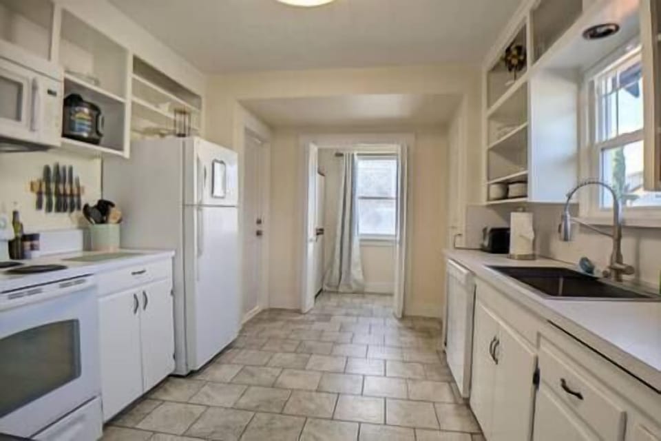 Cook meals or heat take out in this fully equipped kitchen.