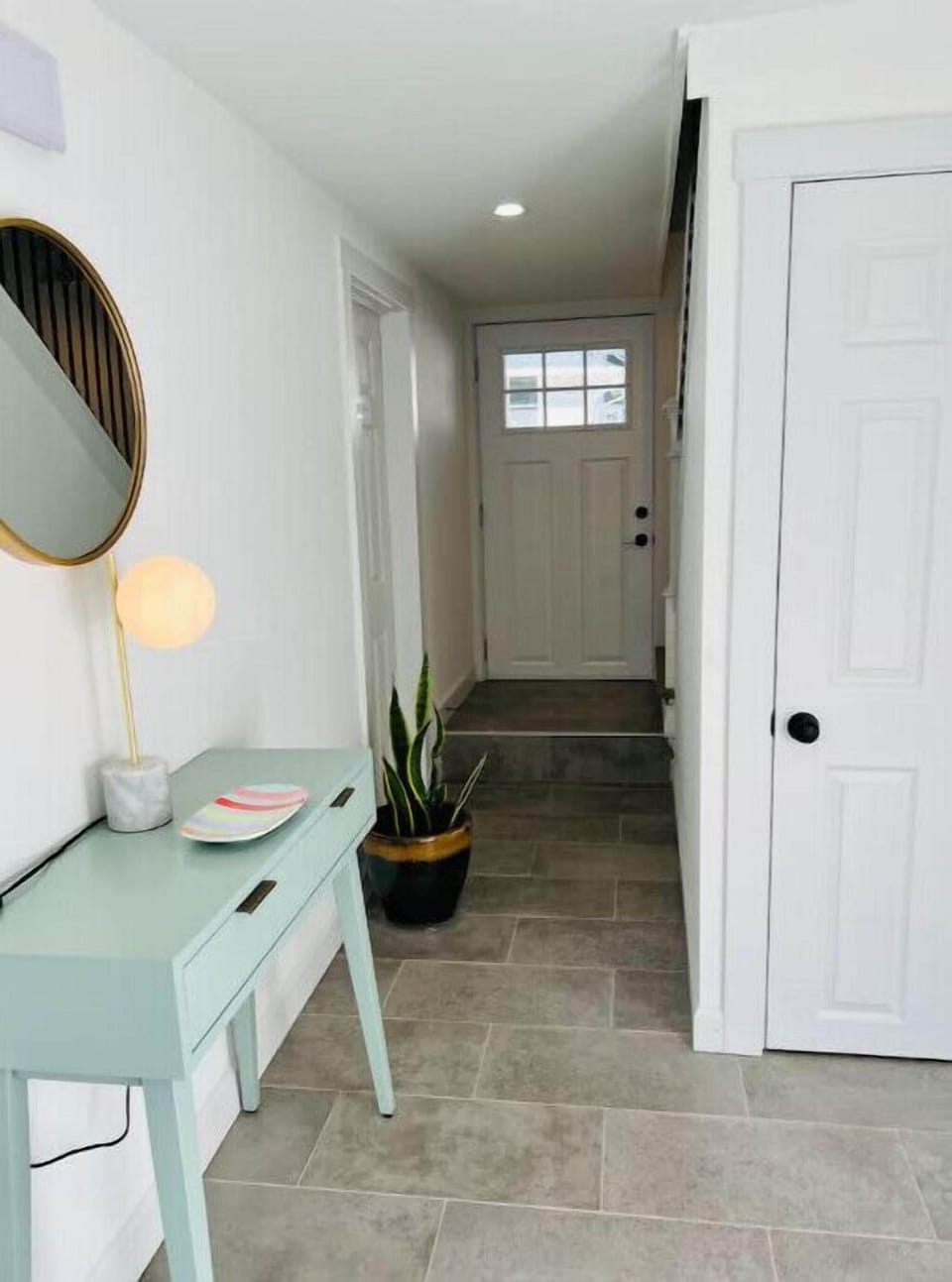 A gracious entryway - the convenient place to drop your beach gear.
