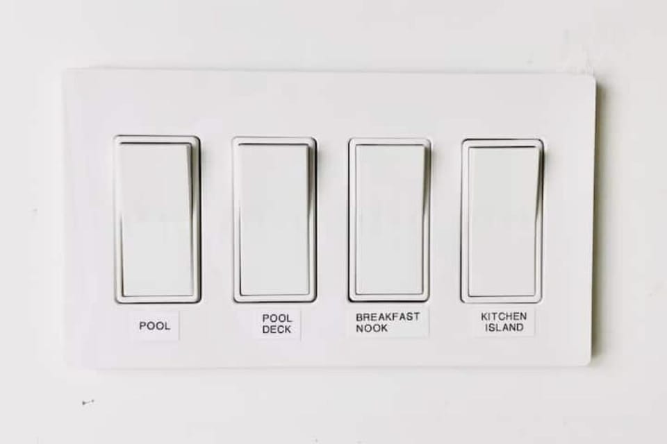 Labeled light switches. 