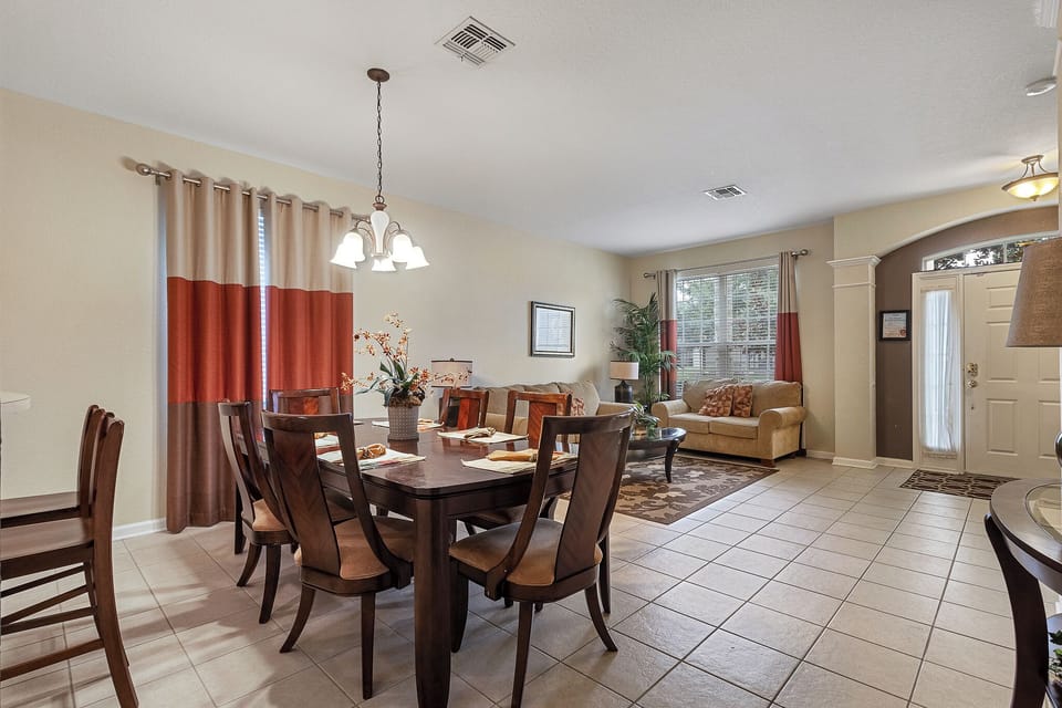Dining Area That Seats 6 People With Entryway & Living Room 