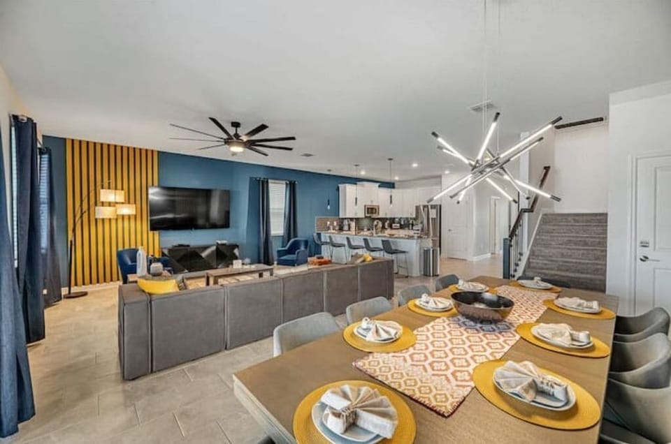 View of Living Room, Dining Area, Kitchen & Stairs to Second Floor