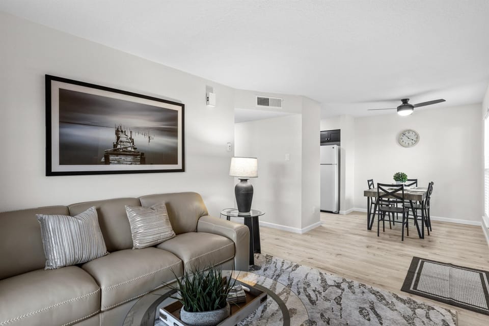 Beautifully appointed with a cozy genuine leather couch