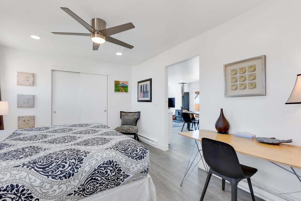 Primary Bedroom
-King Bed
-Ensuite Bathroom
-Ceiling fan
-Workspace