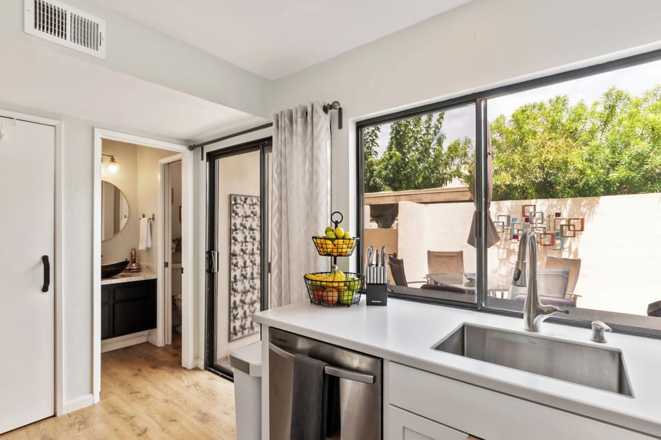 Kitchen with pass through window to courtyard