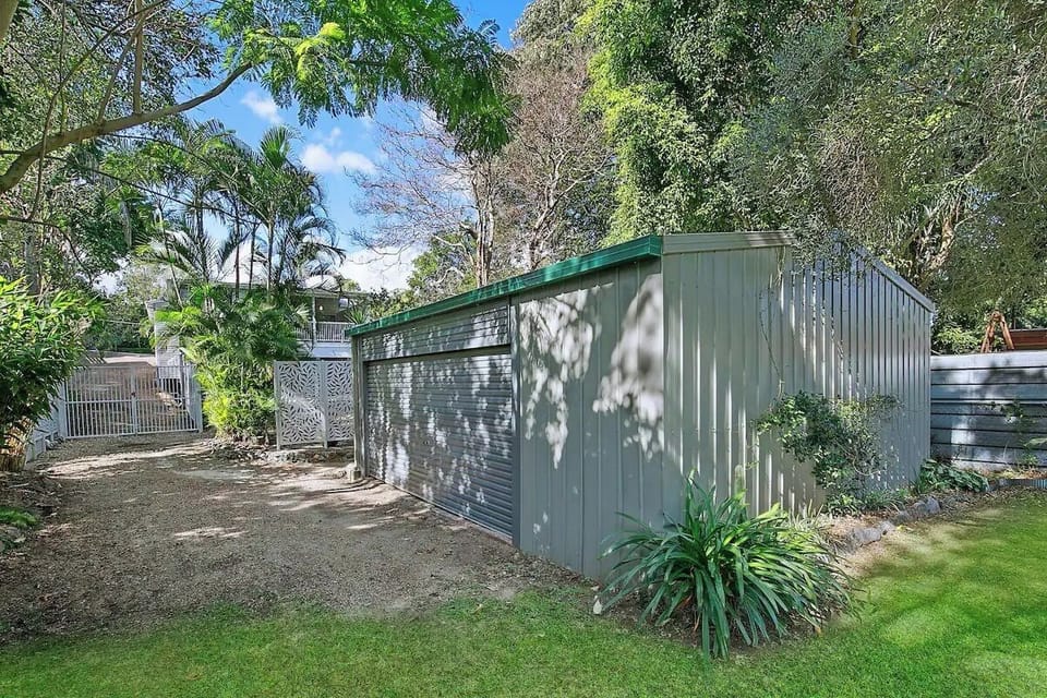 Garden and 3 car shed
