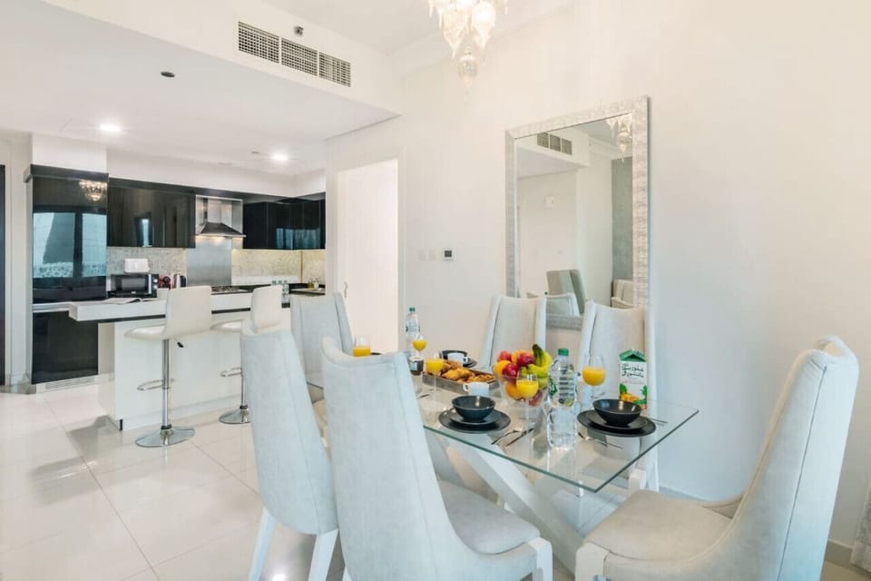Dining Room: Savor meals in a stylish space with modern decor and vibrant city views!