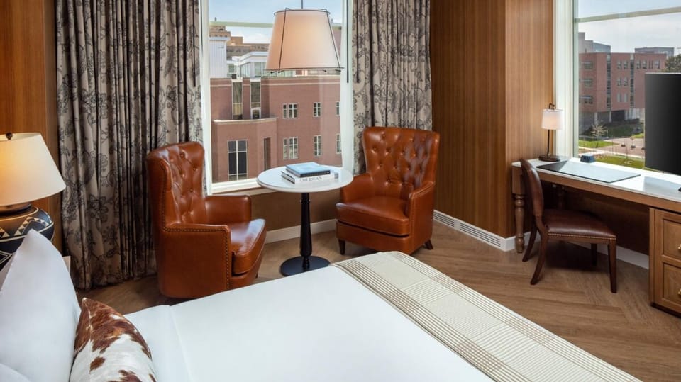 Sip morning coffee by the window in plush leather chairs.