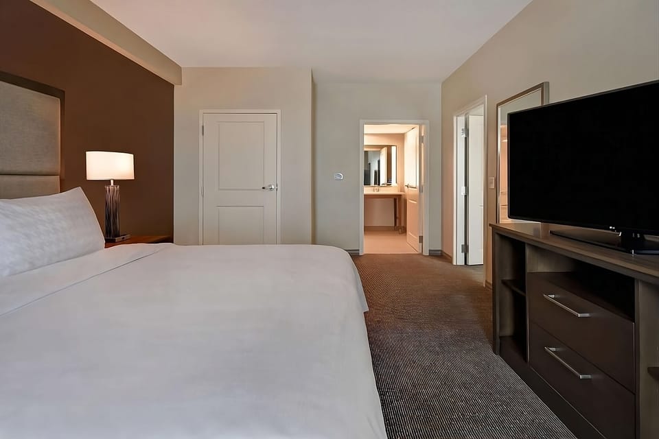 Recharge beside soft lighting and a large TV for nights in.