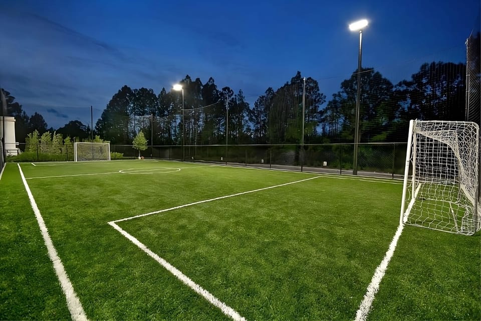 Kick back with an evening match on the lit soccer field.