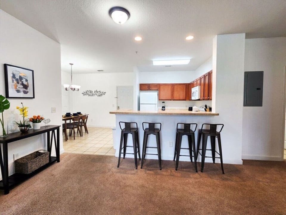 - Spacious kitchen bar - breakfast counter with seating great for casual dining near Orlando attractions  