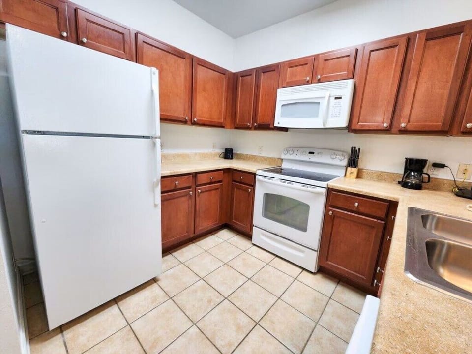 - Clean modern kitchen - equipped with all essentials for family cooking during your Orlando vacation  