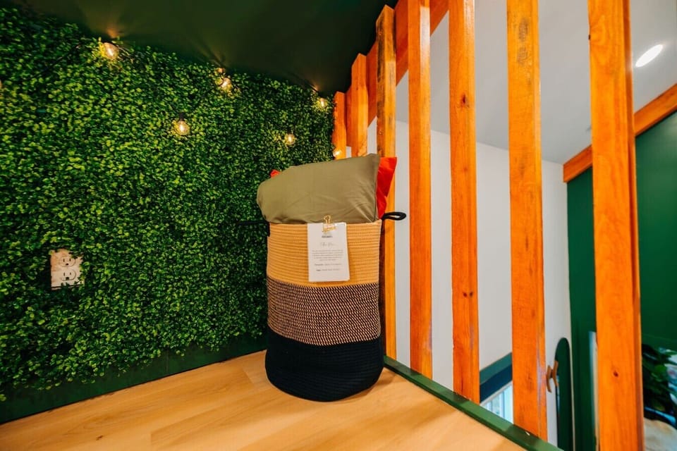 Thoughtful loft touches and extra pillows add comfort to this intimate cabin space above the main floor.