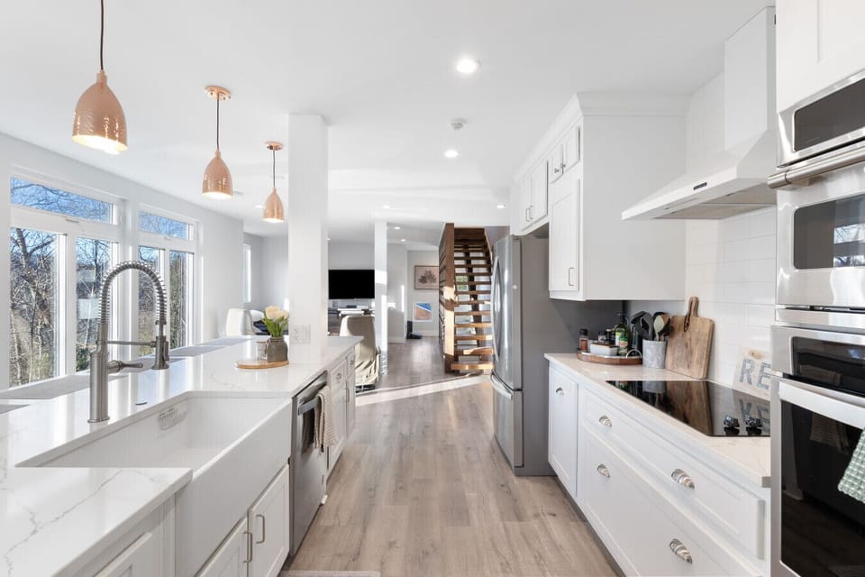 Kitchen with electric cooktop and double oven