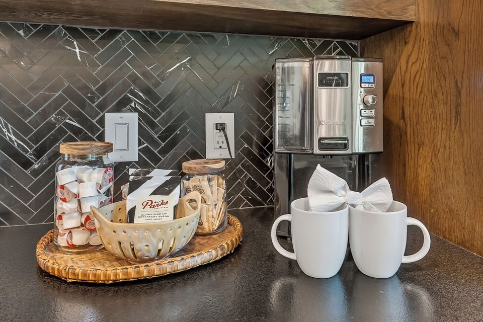 Coffee Corner: Enjoy fresh brews and delightful treats in this stylish, sunlit space!
