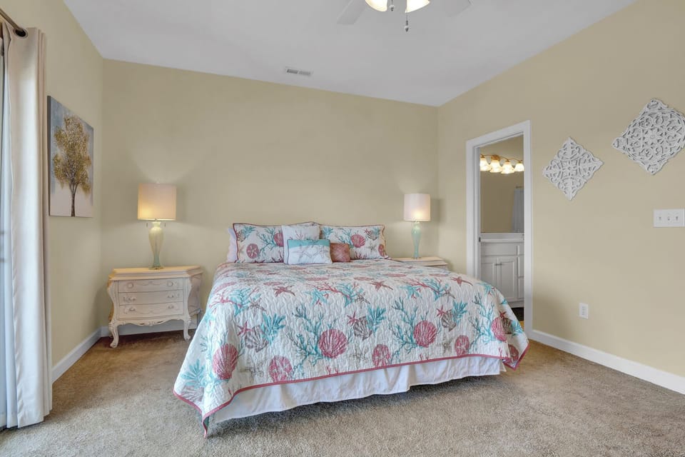 Unit 1 - King bedroom, 2nd floor, with deck access and attached full bath