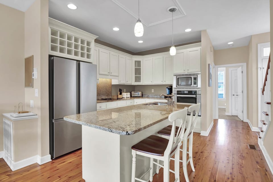 Unit 1 - Open floor plan with large kitchen island that provides additional seating