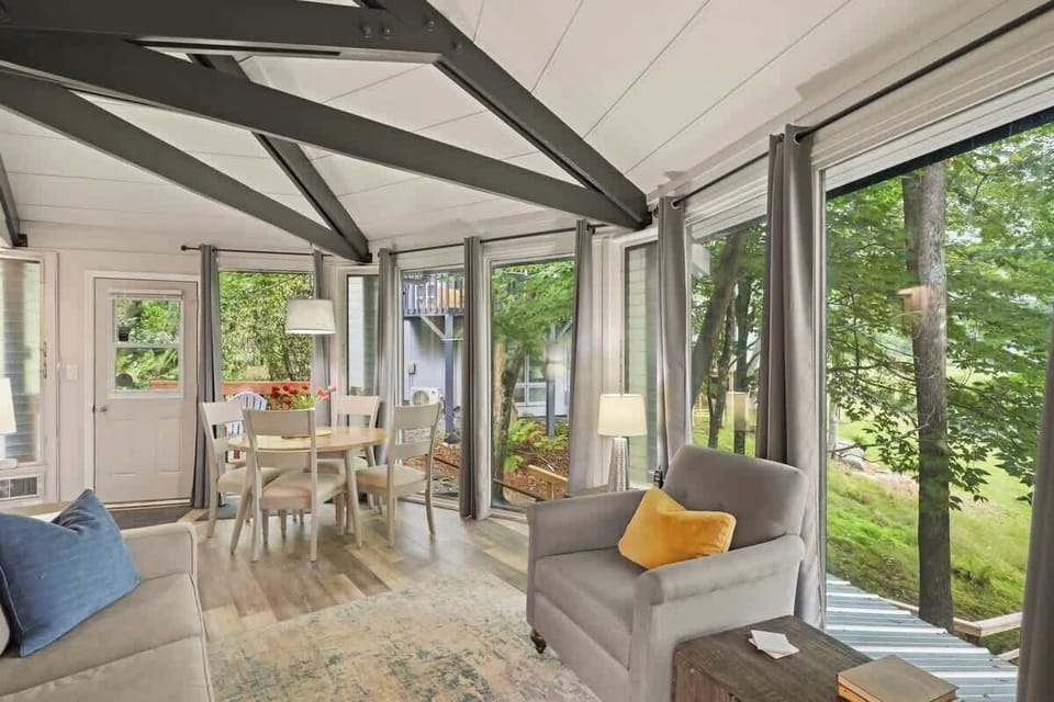 From our living room, soak in the beauty of the slopes just outside your window. A perfect blend of comfort and winter wonder awaits in this cozy mountain retreat.