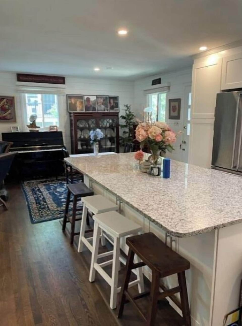 Open concept kitchen/family/dining with enormous island.