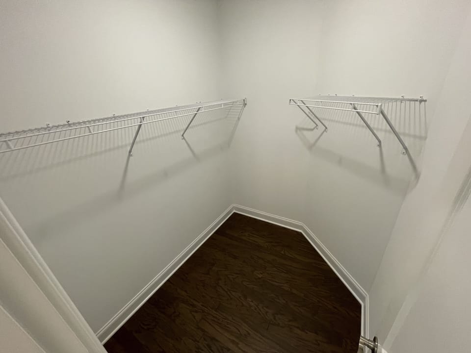 Each bedroom has walk in closet.