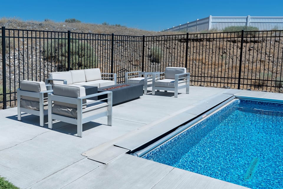 Plenty of seating for everyone. Blue Tooth speakers surround the yard for your  music enjoyment