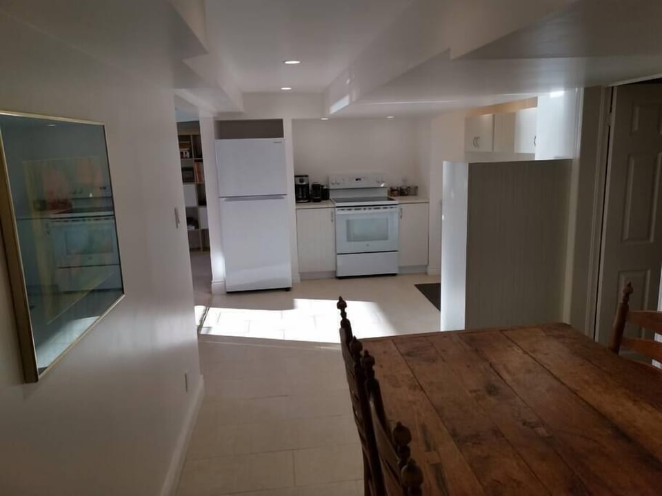 SkyView has a full kitchen and a dining table that can seat 6.