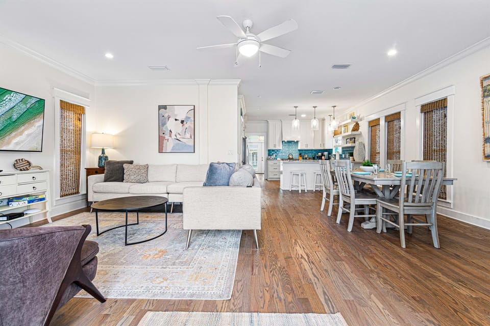 First Floor Living Room-Relax and recharge—literally! Our couch comes equipped with built-in USB ports, letting you unwind comfortably while keeping your devices charged for your convenience. There is also a tv, games and easy access to the front porch.