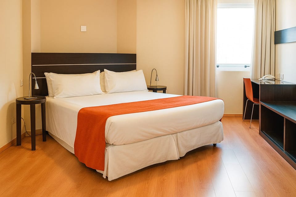 Wake up to soft daylight and a perfectly made bed.