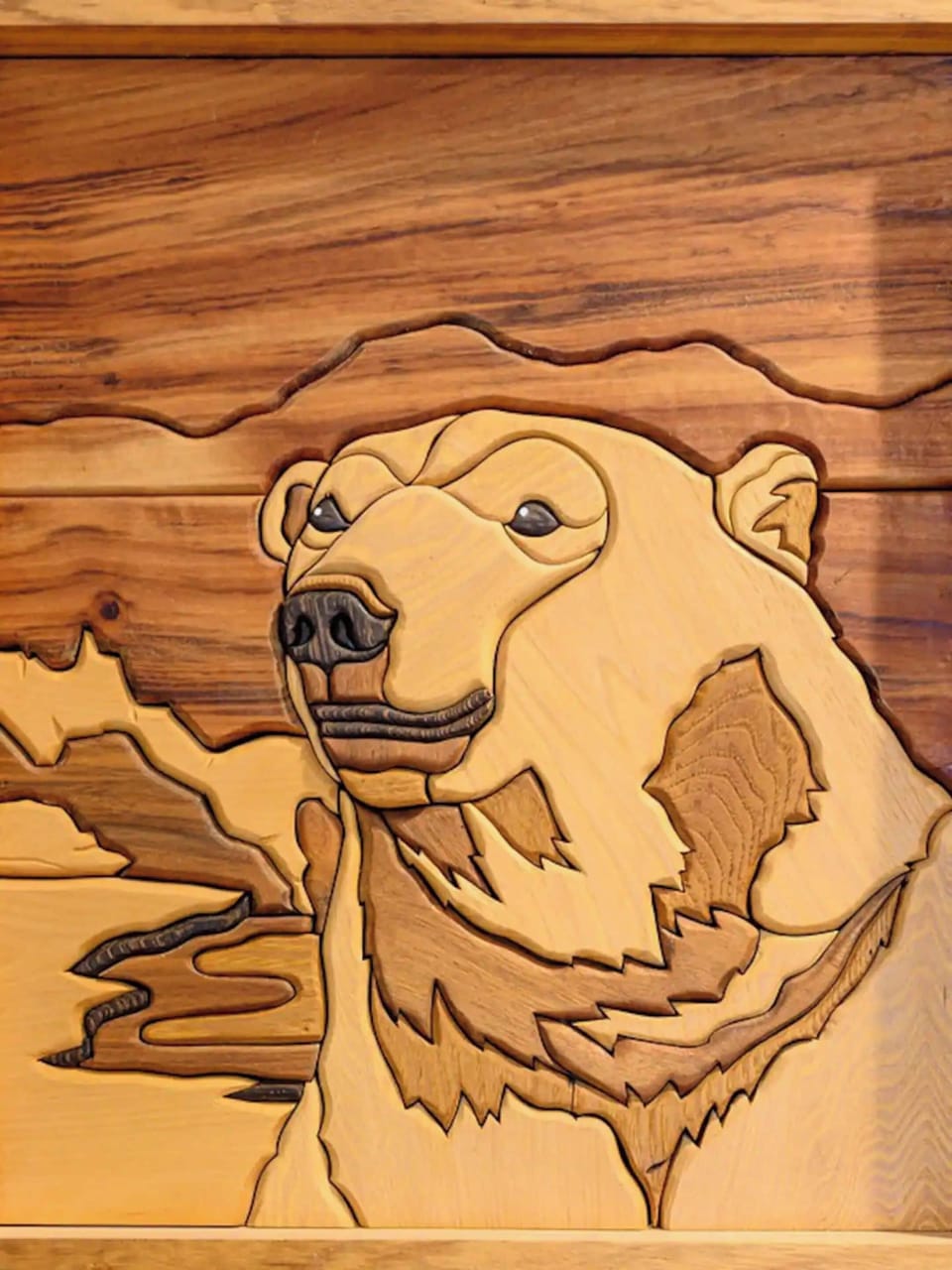 A captivating display of bear wood carvings that bring the wilderness to life.