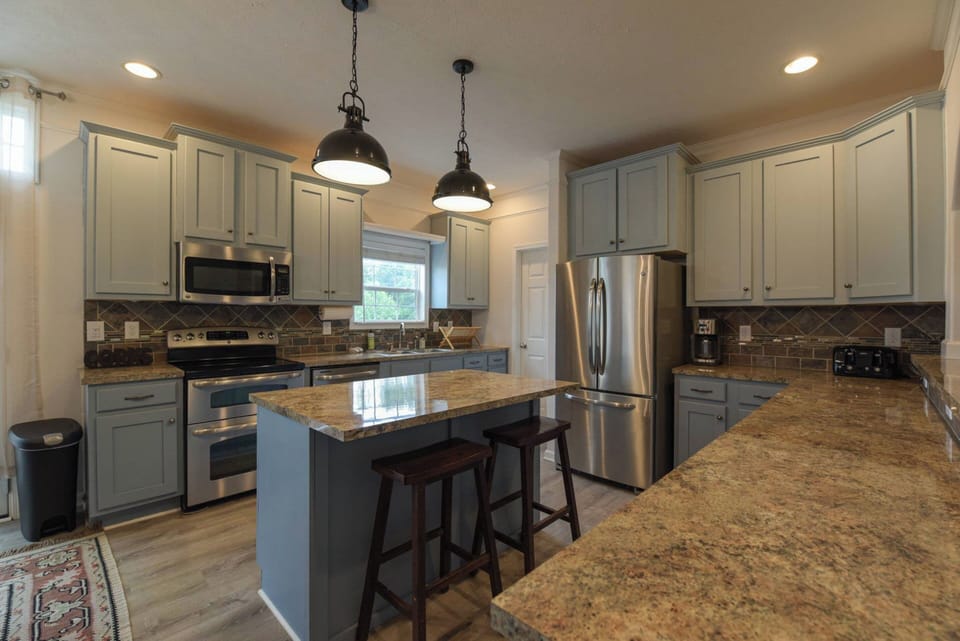 Features stainless steel appliances.