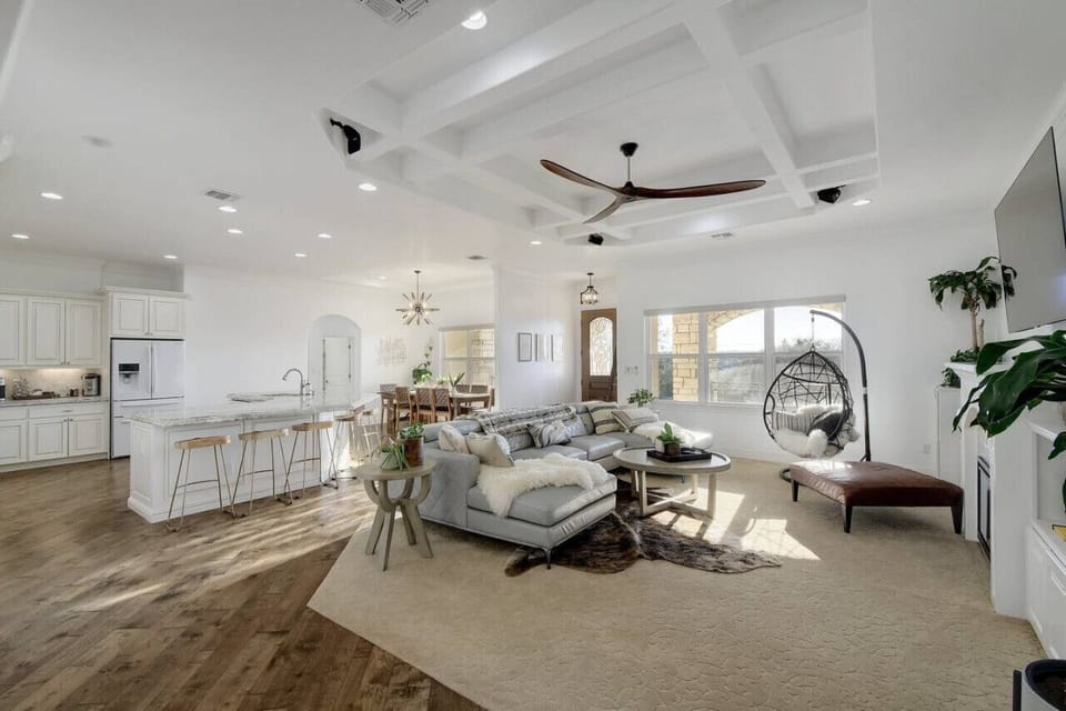 The massive living space has plenty of room for everyone to gather or unwind.