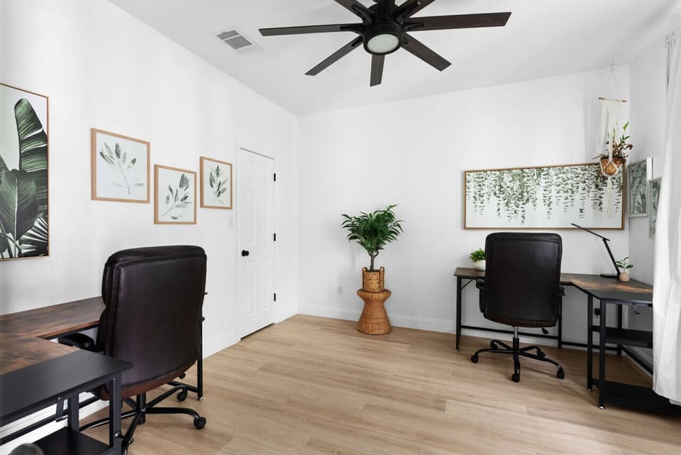Home Office Retreat: Dual workspaces bathed in natural light, perfect for productivity in style!