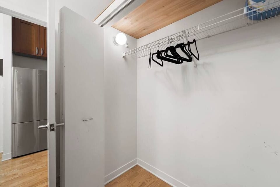 Entry area w/ hooks and shelf space for jackets, bags, & daily grab-and-go items.