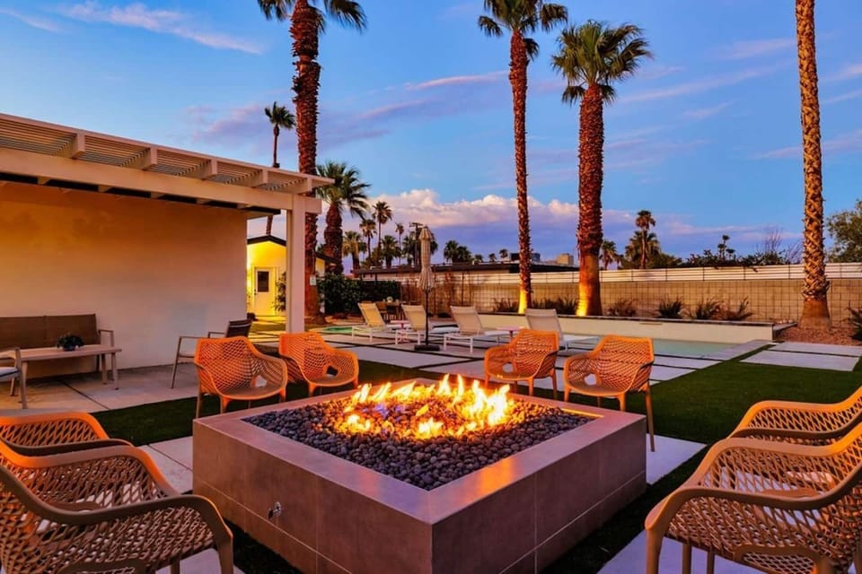 Savor a relaxed evening with friends gathered around the firepit.