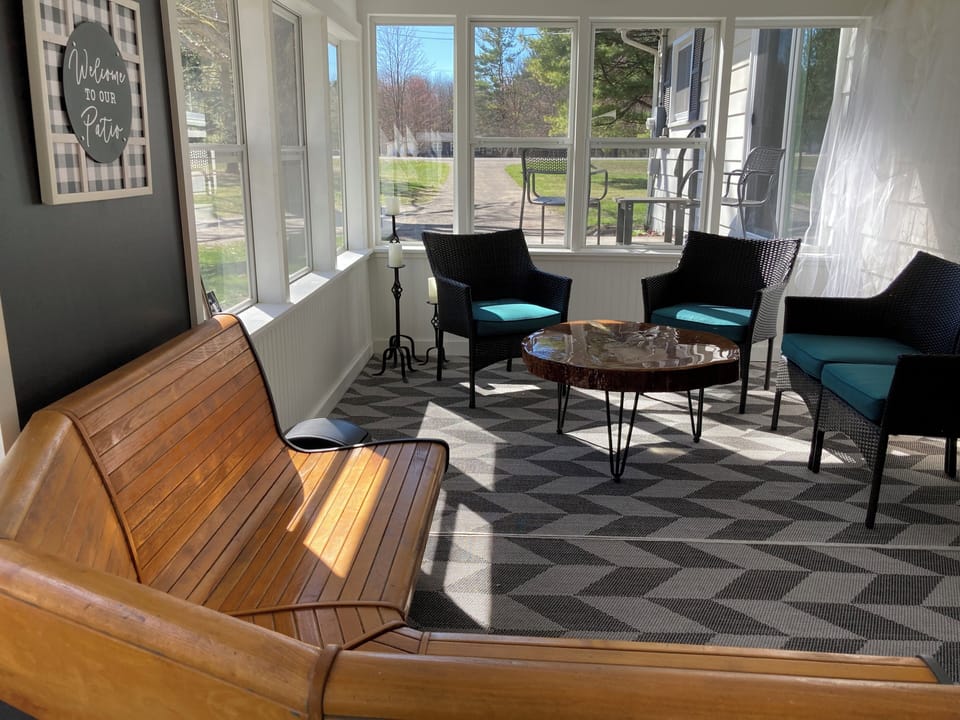 Cozy sun room to unwind in.