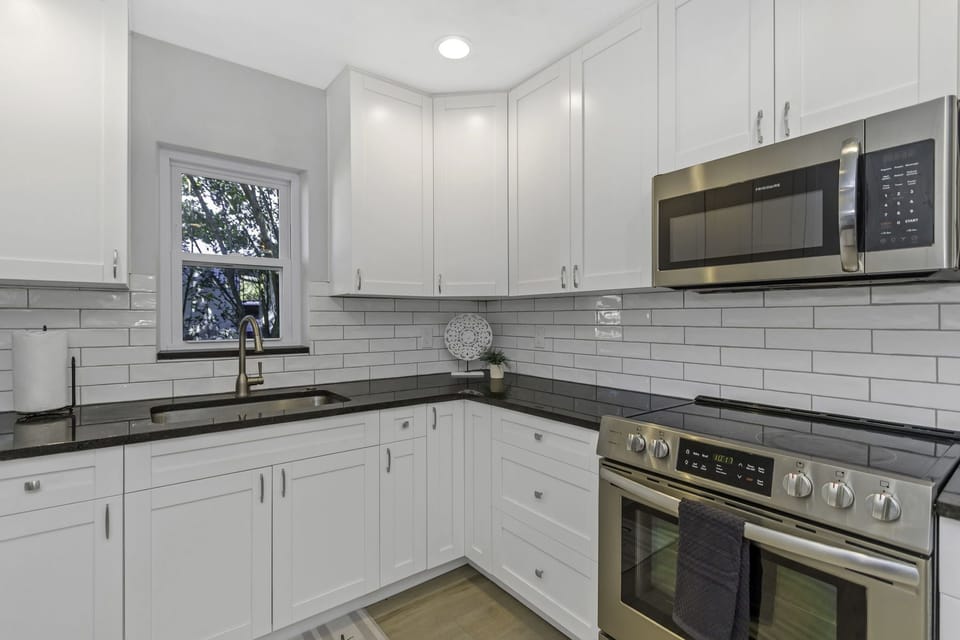 Kitchen with Granite countertops and soft close cabinets