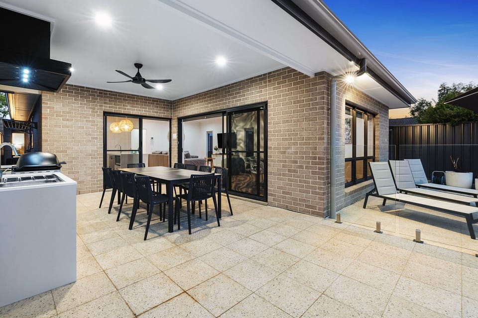 Undercover alfresco area and outdoor kitchen with Weber Q