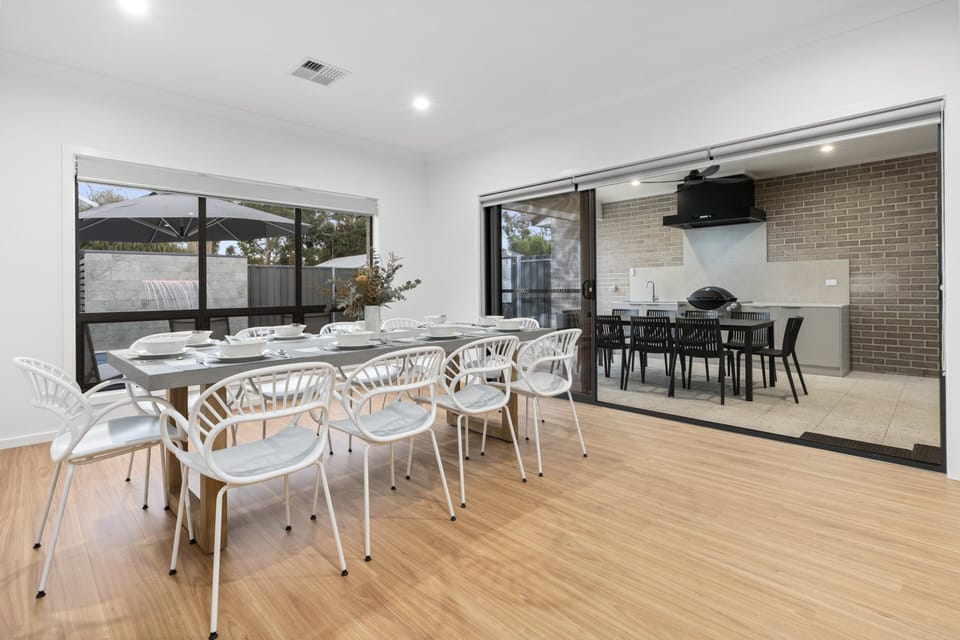Indoor and outdoor dining areas, overlooking the pool 