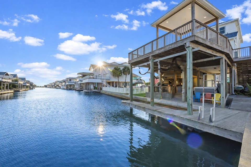 Beautiful waterfront property featuring a private boat slip and direct canal access, ideal for boating, fishing, and coastal living.