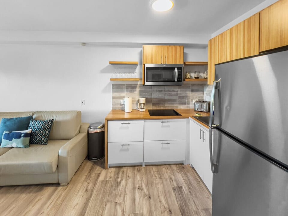 Clean, Practical Kitchen Ready for Your Favorite Meals”
