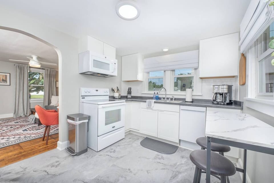 Fully stocked kitchen with all new appliances. Two person high top table to enjoy breakfast at.