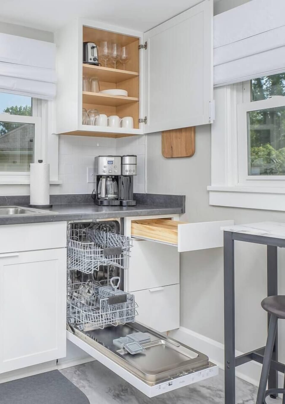 Including dishwasher, microwave, 2-way dual coffee maker, toaster, hand mixer, blender, and crock pot. 