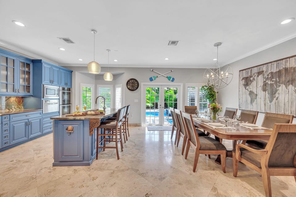 The dining room features a large table with seating for the entire family.