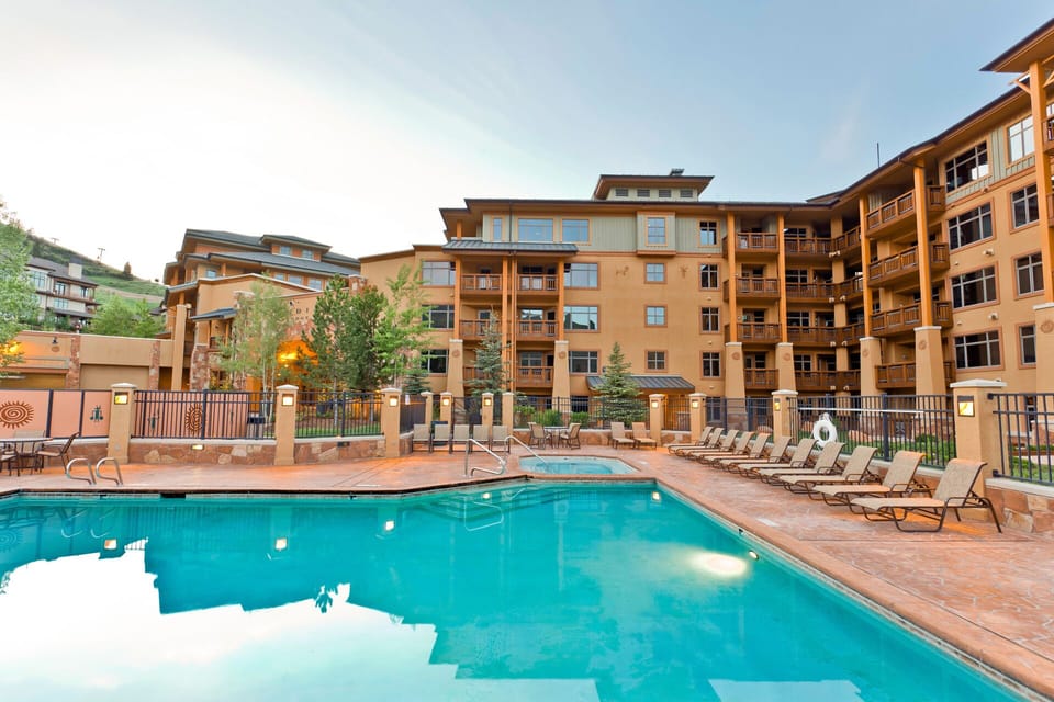 Outdoor heated pool with hot tub