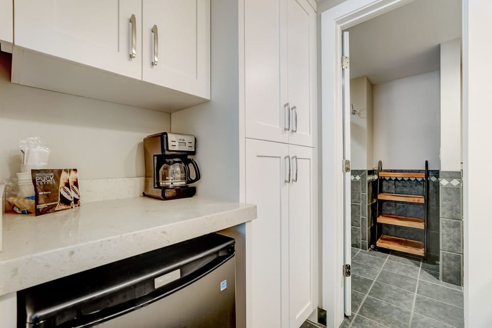 Microwave, mini fridge, and drip coffee maker
