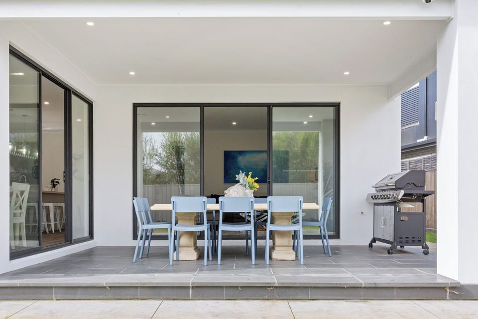 Outdoor dining area with BBQ