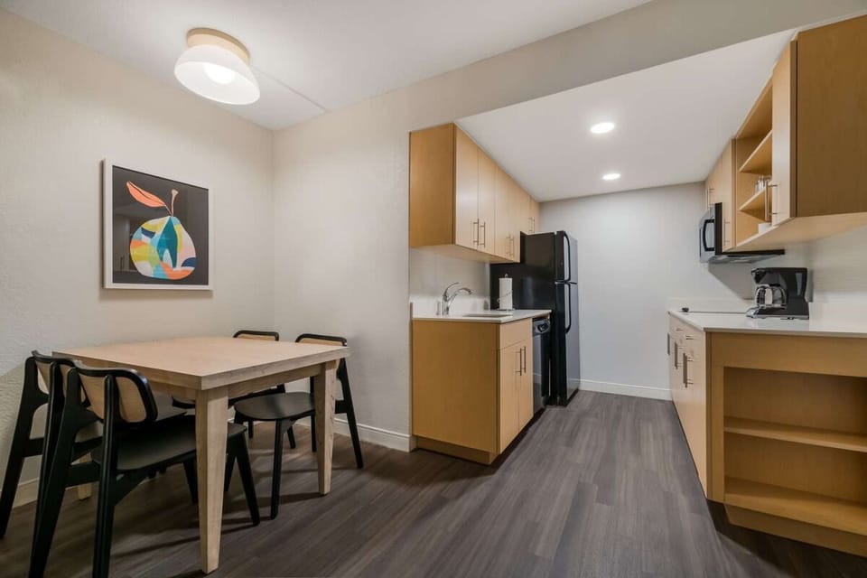 Start mornings with coffee and simple comforts in-room.