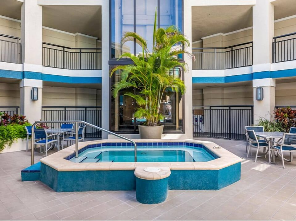 Unwind in bubbling waters surrounded by a sunny courtyard.