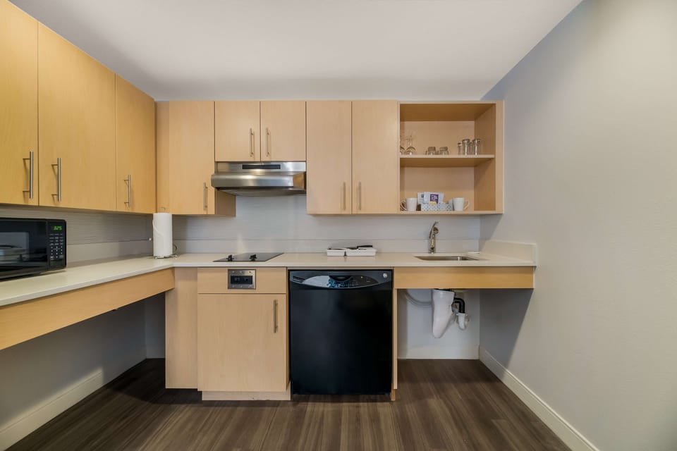 Cook light meals easily with sleek counters and handy appliances.