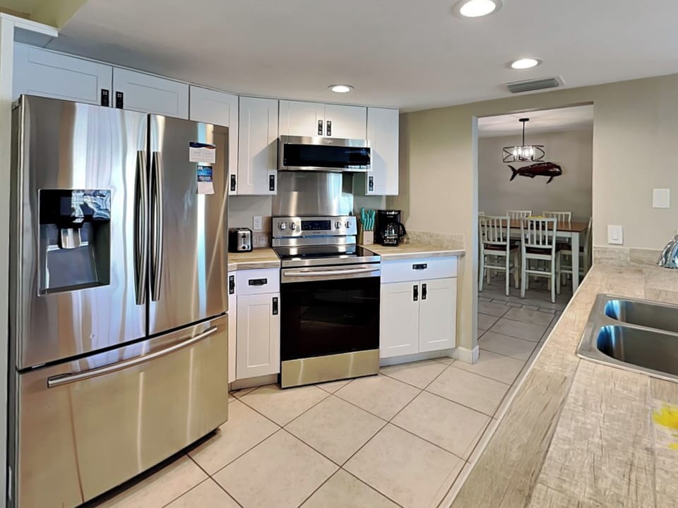 Fully Equipped Kitchen with Stainless Steel Appliances
