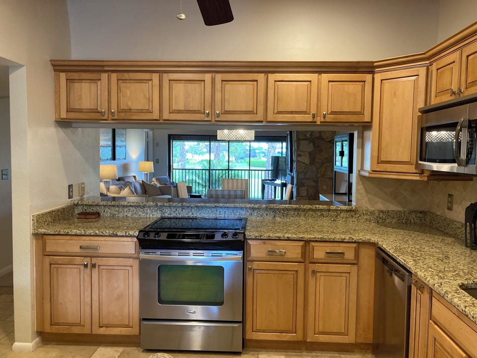 Large and pristine new kitchen. Granite counter tops and Whirlpool appliances.